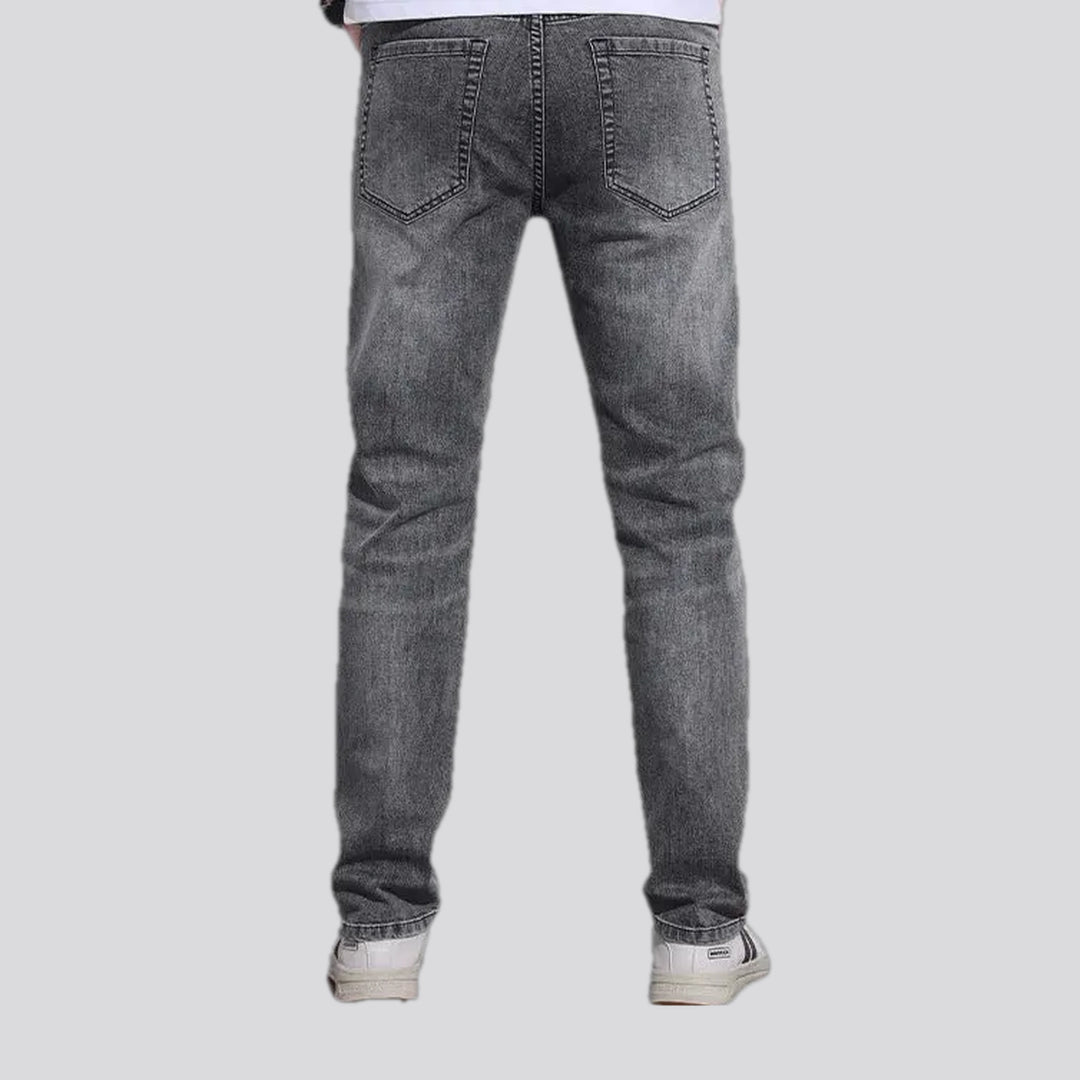 Abraded stonewashed slim men's jeans